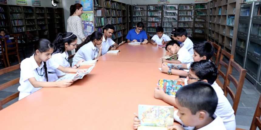 students reading books in library